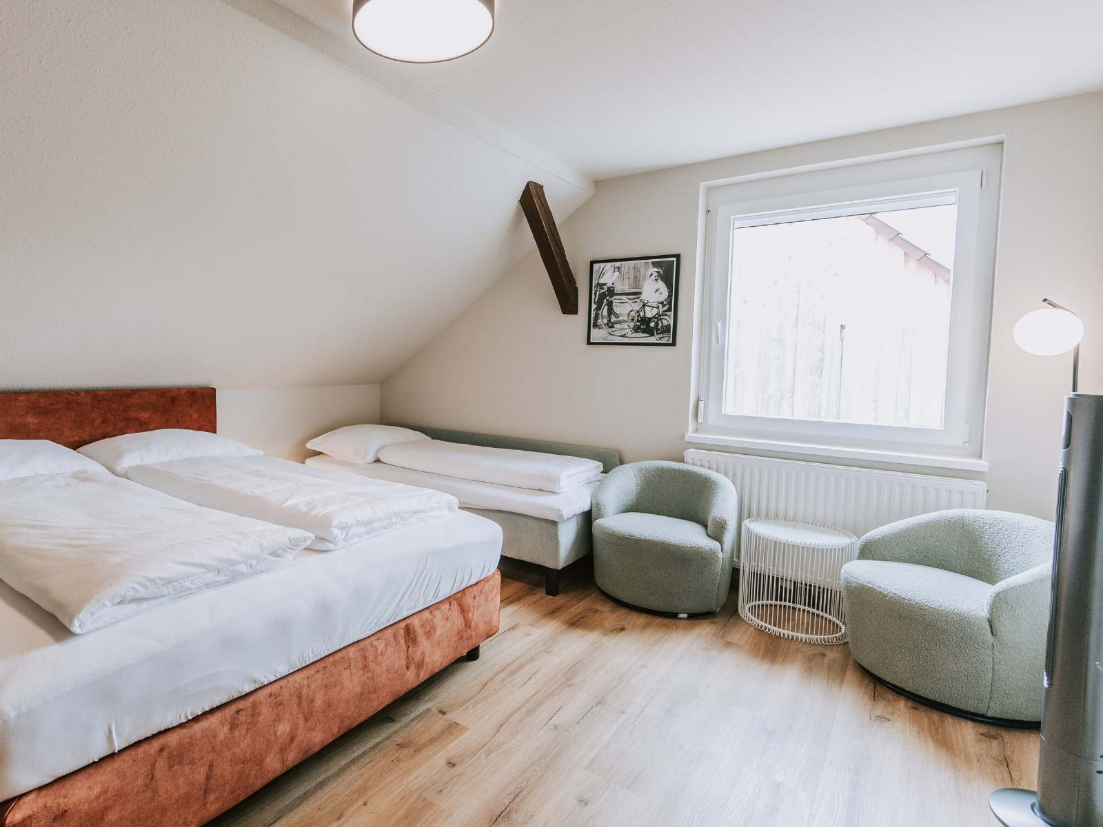 Mehrbettzimmer "Team Time" im Velotique Hotel in Hard am Bodensee